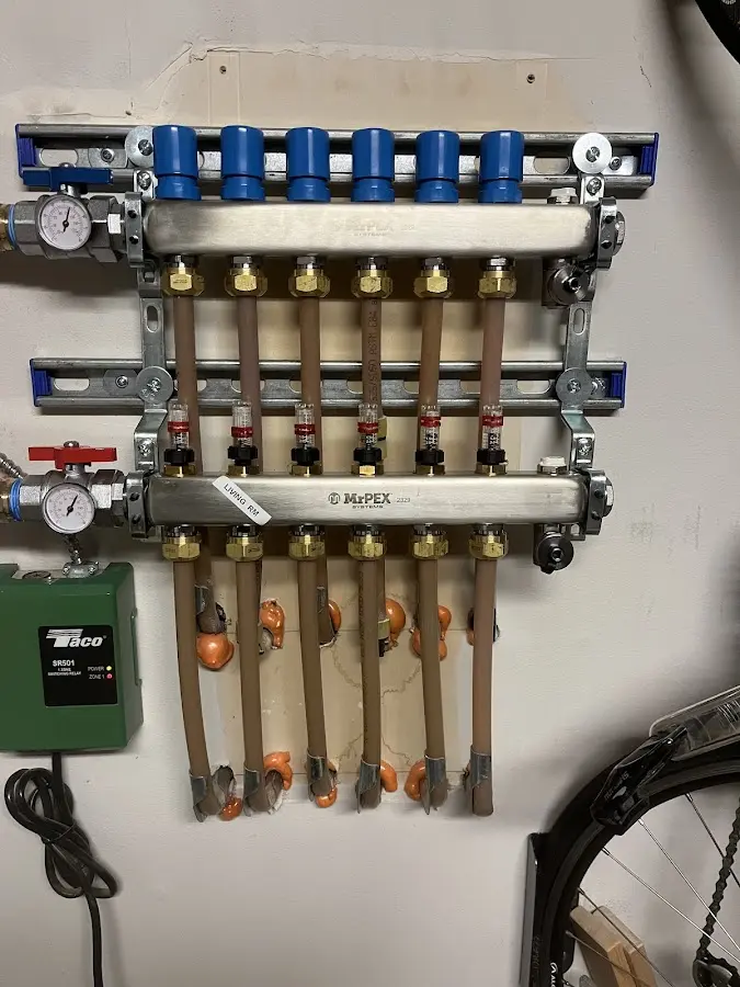 Plumber performing Gas Line Installation at a residential property in Kennebunk