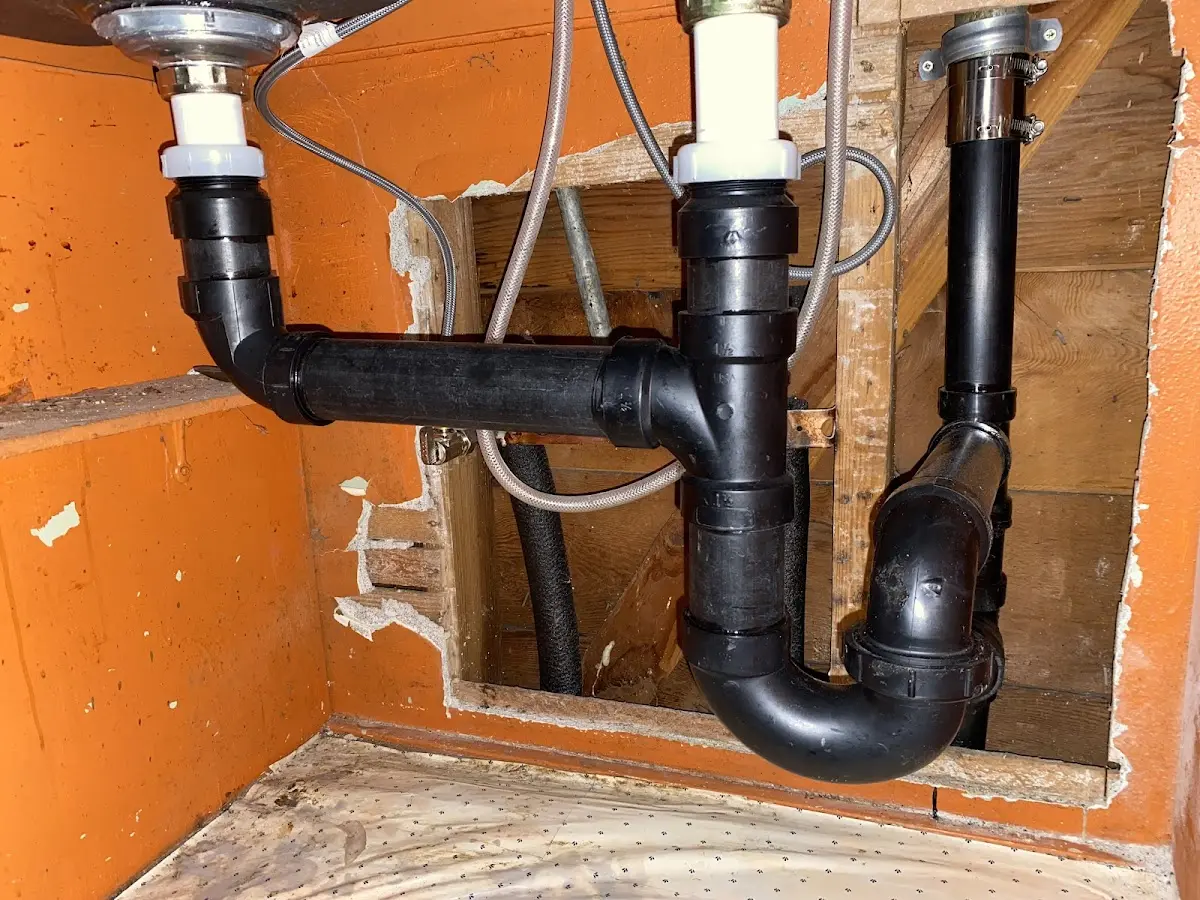 Professional Garbage Disposal Repair equipment and tools on the job in Kennebunk